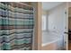 Bathroom with shower/tub combo and updated vanity at 113 Omega Ct, Dallas, GA 30157