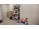 Garage storage area with shelving and various tools at 113 Omega Ct, Dallas, GA 30157