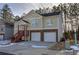 Two-story house with double garage and a covered front porch at 113 Omega Ct, Dallas, GA 30157