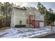 Two-story house with double garage and a covered front porch at 113 Omega Ct, Dallas, GA 30157