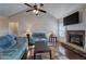 Spacious living room with fireplace, vaulted ceiling and ceiling fan at 113 Omega Ct, Dallas, GA 30157