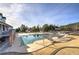 Resort-style pool with covered seating areas at 113 Omega Ct, Dallas, GA 30157