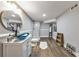 Basement bathroom with walk-in shower and blue sink at 1810 Kinridge Rd, Marietta, GA 30062