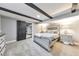 Basement bedroom with gray walls and a modern bed frame at 1810 Kinridge Rd, Marietta, GA 30062