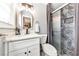 Modern bathroom with a walk-in shower and white vanity at 1810 Kinridge Rd, Marietta, GA 30062