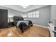 Bedroom with a full-size bed and hardwood floors at 1810 Kinridge Rd, Marietta, GA 30062