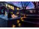 Evening view of home showing deck and landscaping at 1810 Kinridge Rd, Marietta, GA 30062