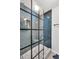 Shower with frameless glass enclosure and herringbone tile at 23304 Plantation Ne Dr # 304, Atlanta, GA 30324