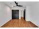 Bright bedroom with wood floors, ceiling fan, and large closet at 23304 Plantation Ne Dr # 304, Atlanta, GA 30324