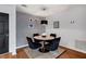 Modern dining area with round table and four black chairs at 23304 Plantation Ne Dr # 304, Atlanta, GA 30324