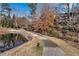 Scenic walkway along a pond with beautiful landscaping at 23304 Plantation Ne Dr # 304, Atlanta, GA 30324