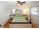 Charming bedroom with a queen bed and updated nightstands at 4924 River Rd, Ellenwood, GA 30294