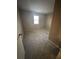 Spacious bedroom with carpeted floor and window at 5451 Zachary Dr, Stone Mountain, GA 30083