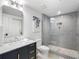 Modern bathroom with a walk in shower and floating vanity at 595 Sherwood Ne Rd, Atlanta, GA 30324