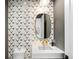 Modern bathroom with unique geometric tilework at 595 Sherwood Ne Rd, Atlanta, GA 30324