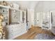 Charming Bedroom with built-in shelving and a whimsical wall decal at 595 Sherwood Ne Rd, Atlanta, GA 30324