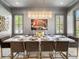 Elegant dining room with marble table and gray walls at 595 Sherwood Ne Rd, Atlanta, GA 30324