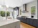 Modern kitchen with marble counters and stainless steel appliances at 595 Sherwood Ne Rd, Atlanta, GA 30324