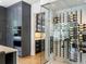 Walk-in wine cellar with glass enclosure and extensive wine storage at 595 Sherwood Ne Rd, Atlanta, GA 30324