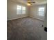 Spacious bedroom with neutral walls and plush carpeting at 1991 Judy Se Cir, Marietta, GA 30060