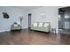 Spacious living room with hardwood floors and green sofas at 1991 Judy Se Cir, Marietta, GA 30060