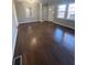 Spacious living room with hardwood floors and lots of natural light at 1991 Judy Se Cir, Marietta, GA 30060