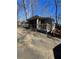 Inviting screened porch with a wooden deck and a view of the woods at 1991 Judy Se Cir, Marietta, GA 30060