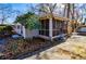 Relaxing screened porch with wooden swing and yard access at 1991 Judy Se Cir, Marietta, GA 30060