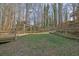 Large backyard with pergola and terraced landscaping at 3796 Hickory Ridge Ct, Marietta, GA 30066