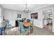 Bright dining room with wood table and blue chairs at 3796 Hickory Ridge Ct, Marietta, GA 30066