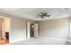 Spacious bedroom with carpeted floor and ceiling fan at 4001 Village Crossing Cir, Ellenwood, GA 30294