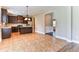 Kitchen with dark cabinets, granite counters, and island at 4001 Village Crossing Cir, Ellenwood, GA 30294