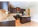 Modern kitchen with granite counters and ample cabinetry at 4001 Village Crossing Cir, Ellenwood, GA 30294