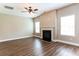 Spacious living room featuring hardwood floors and a fireplace at 4001 Village Crossing Cir, Ellenwood, GA 30294