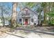 Charming two-story home with red door and private patio at 841 United Se Ave, Atlanta, GA 30312