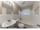 Clean bathroom with white tile, bathtub, and updated fixtures at 3110 Mcafee Rd, Decatur, GA 30032