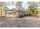 Ranch house with carport and well-maintained landscaping at 3110 Mcafee Rd, Decatur, GA 30032