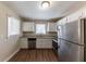 Renovated kitchen with stainless steel appliances at 3110 Mcafee Rd, Decatur, GA 30032