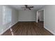 Living room with hardwood floors and ceiling fan at 3110 Mcafee Rd, Decatur, GA 30032