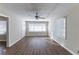 Spacious living room with hardwood floors and ceiling fan at 3110 Mcafee Rd, Decatur, GA 30032