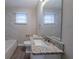 Bathroom boasts granite countertop and tile at 491 Elbridge Nw Dr, Atlanta, GA 30318