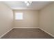 Spacious bedroom with neutral walls and carpet flooring at 491 Elbridge Nw Dr, Atlanta, GA 30318