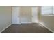 Spacious bedroom with neutral walls and carpet flooring at 491 Elbridge Nw Dr, Atlanta, GA 30318
