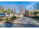 Cute Ranch home with a large driveway and well-maintained lawn at 491 Elbridge Nw Dr, Atlanta, GA 30318