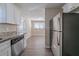 Modern kitchen with granite countertops and stainless steel appliances at 491 Elbridge Nw Dr, Atlanta, GA 30318