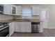 Modern kitchen with granite countertops and stainless steel appliances at 491 Elbridge Nw Dr, Atlanta, GA 30318