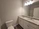 Bathroom with granite double vanity and updated fixtures at 28 Loth Wages (Lot 28) Rd, Dacula, GA 30019