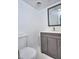 Basement bathroom with gray vanity and hexagon floor tiles at 4593 Bexley Way, Stone Mountain, GA 30083