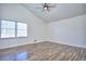 Spacious bedroom with hardwood floors and a ceiling fan at 4593 Bexley Way, Stone Mountain, GA 30083