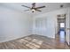 Spacious bedroom featuring wood-look floors and ample closet space at 4593 Bexley Way, Stone Mountain, GA 30083